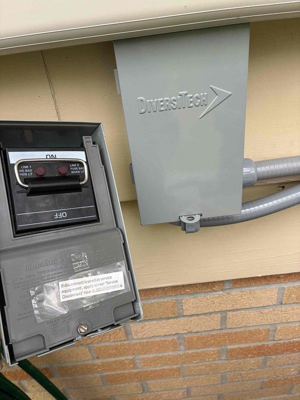 Replaced damaged 60-amp electrical disconnect switch that was bent during initial installation. Removed the compromised disconnect box, installed new unit with proper wiring connections to terminal block, and verified all electrical connections were secure and operational.
