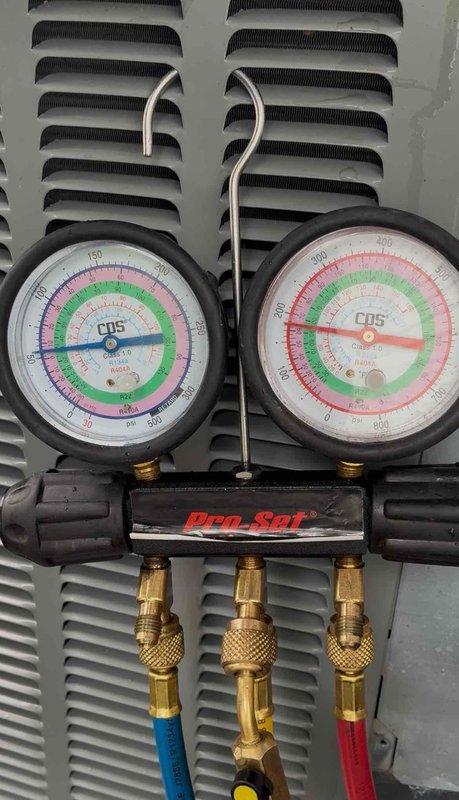 Responded to no cooling complaint and performed diagnostic testing on residential air conditioning system. Connected manifold gauge set to measure refrigerant pressures and assess system performance. System evaluation completed with pressure readings documented for proper cooling operation.