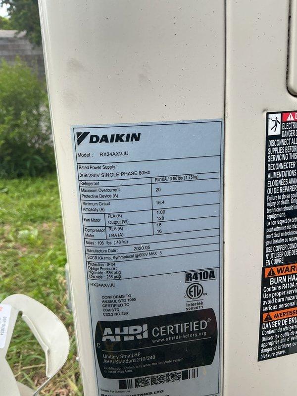 Responded to no cooling call for central AC system and mini-split unit. Inspected Daikin RX24AXVJU outdoor condenser unit and confirmed operational status of equipment. One of two mini-split systems reported power button flashing without unit activation, requiring diagnostic evaluation of indoor head unit and electrical components.