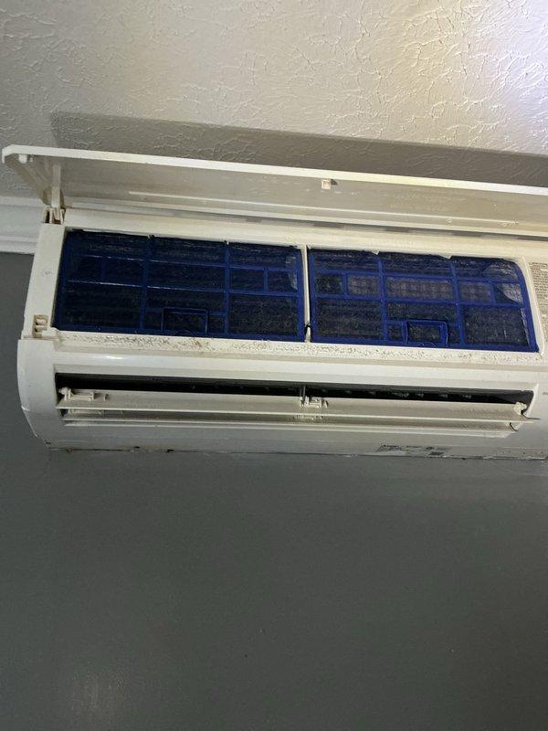 Responded to service call for wall-mounted mini-split unit with reported water leakage down wall due to suspected disconnected condensate drain line. Upon inspection, accessed internal components by opening front panel and assessed unit condition. Noted dirty air filter requiring attention and documented unit status. Provided customer with information regarding preventative maintenance program benefits, including regular system inspections, energy efficiency optimization, and technician certification standards for ongoing equipment care.