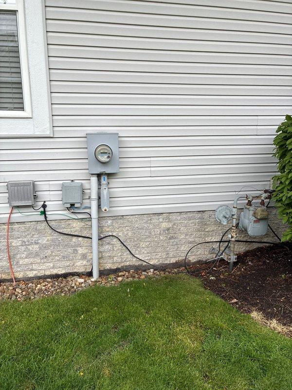 Conducted comprehensive site evaluation for residential air conditioning system replacement. Assessed existing outdoor condenser units, utility connections, and installation area to provide customer with multiple replacement options. Documented current equipment configuration, electrical service accessibility, gas meter proximity, and available space on existing concrete pads for new equipment installation.