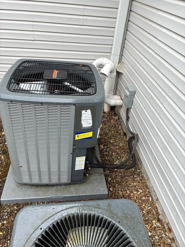 Conducted comprehensive site evaluation for residential air conditioning system replacement. Assessed existing outdoor condenser units, utility connections, and installation area to provide customer with multiple replacement options. Documented current equipment configuration, electrical service accessibility, gas meter proximity, and available space on existing concrete pads for new equipment installation.