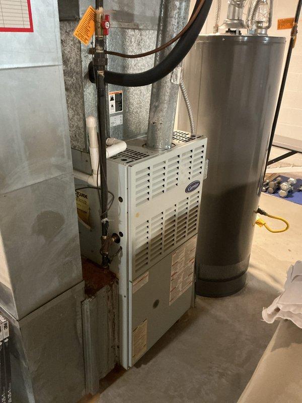 Completed comprehensive cooling maintenance on residential HVAC system, including inspection of Carrier furnace unit, air handler, and associated ductwork. Verified proper operation of humidifier unit, checked all electrical connections, inspected galvanized metal ductwork for leaks or damage, and confirmed system readiness for cooling season.