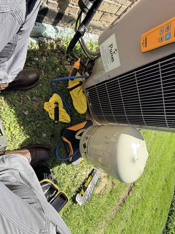 Responded to complaint of inadequate cooling in MG room for 15-year-old Payne air conditioning system. Performed diagnostic evaluation of outdoor condensing unit using digital HVAC measurement tools and Fieldpiece Job Link Scale to assess system performance and refrigerant charge. Conducted thorough inspection of unit components, including compressor operation, condenser coil condition, and electrical connections. System showed signs of age-related wear consistent with 15 years of service. Measured and documented system pressures and temperatures to determine proper refrigerant levels and overall system efficiency. Evaluated cooling capacity and airflow characteristics to identify potential causes of reduced performance in affected room.