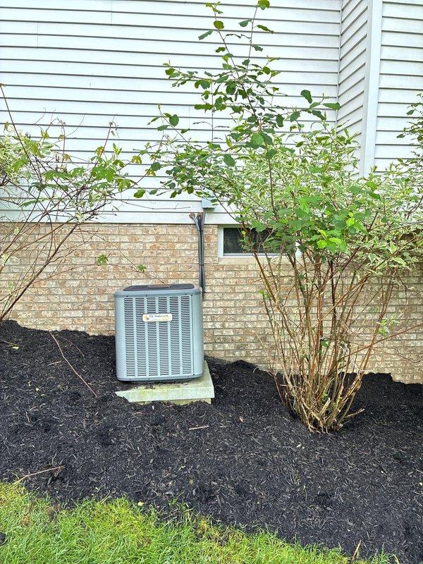 Conducted on-site assessment for furnace replacement options at residential property. Evaluated existing HVAC system including outdoor condensing unit and indoor climate control equipment. Documented current system configuration with exterior AC unit positioned on concrete pad with proper refrigerant line routing along foundation, and interior Honeywell programmable thermostat. Provided homeowner with comprehensive replacement options and recommendations for new furnace installation to improve heating efficiency and system performance.