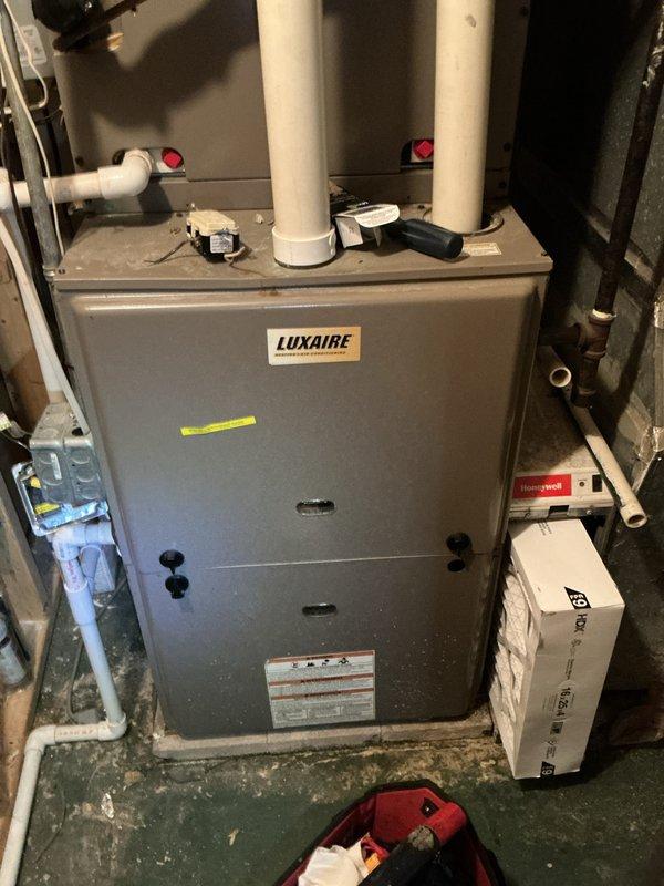 Completed comprehensive cooling and heating maintenance on Luxaire furnace system. Performed standard tune-up procedures including inspection of blower motor assembly, electrical connections, and all major system components. All equipment found operating within normal parameters and system returned to service.