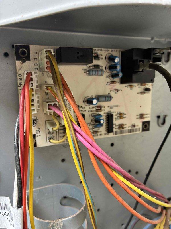 Replaced failed condenser fan motor, dual run capacitor, and defrost control board on residential air conditioning unit. System tested and confirmed operational with proper fan operation and defrost cycle functionality upon completion.