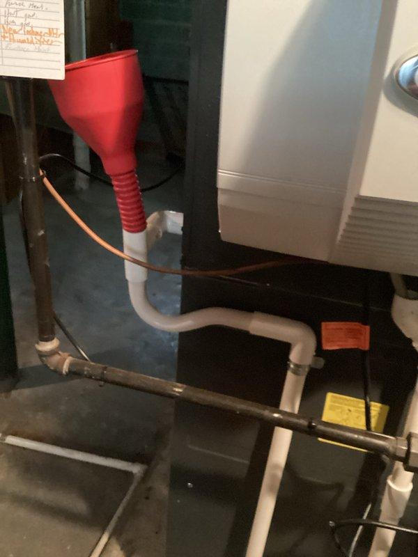 Completed comprehensive cooling system maintenance on HVAC unit. Performed electrical diagnostics using clamp meter to verify proper amperage draw and voltage levels on condenser unit. Inspected condensate drainage system including pump, PVC piping, and collection funnel to ensure proper operation and prevent water damage.