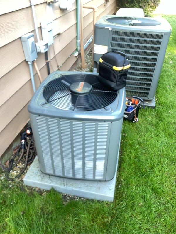 Completed first-year cooling maintenance and MVP A/C tune-up on dual residential condensing units. Performed comprehensive system inspection including electrical connections, capacitor testing, and CoreSense smart control verification on both units, with all components operating within manufacturer specifications.