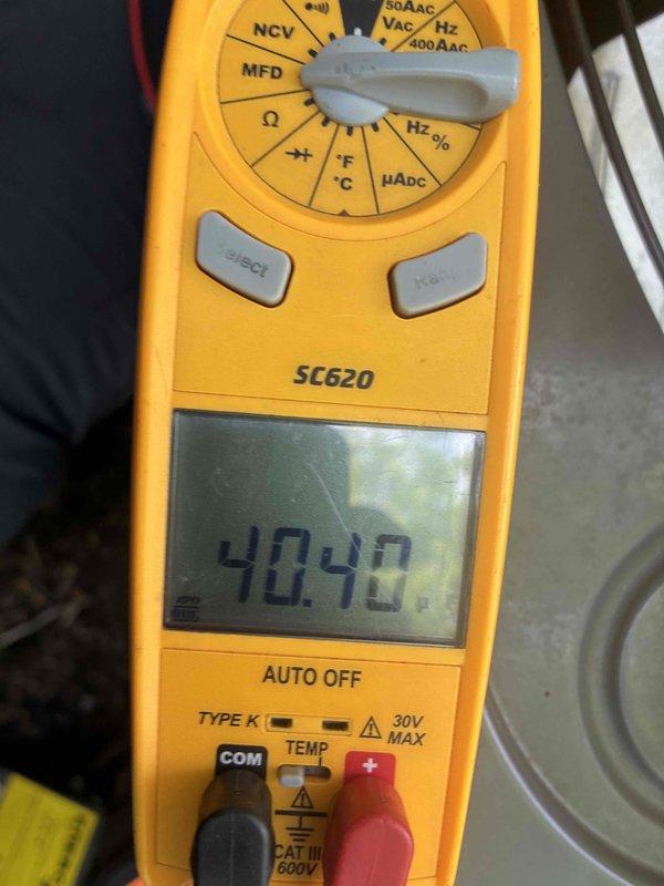 Completed scheduled preventive maintenance on residential cooling system. Performed electrical diagnostics using digital multimeter, measuring capacitor values at 40.40 MFD and verifying voltage readings at 5.13V to ensure proper compressor and fan motor operation. All system components tested within manufacturer specifications and unit operating efficiently.
