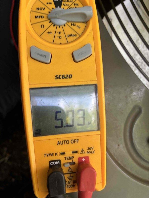 Completed scheduled preventive maintenance on residential cooling system. Performed electrical diagnostics using digital multimeter, measuring capacitor values at 40.40 MFD and verifying voltage readings at 5.13V to ensure proper compressor and fan motor operation. All system components tested within manufacturer specifications and unit operating efficiently.