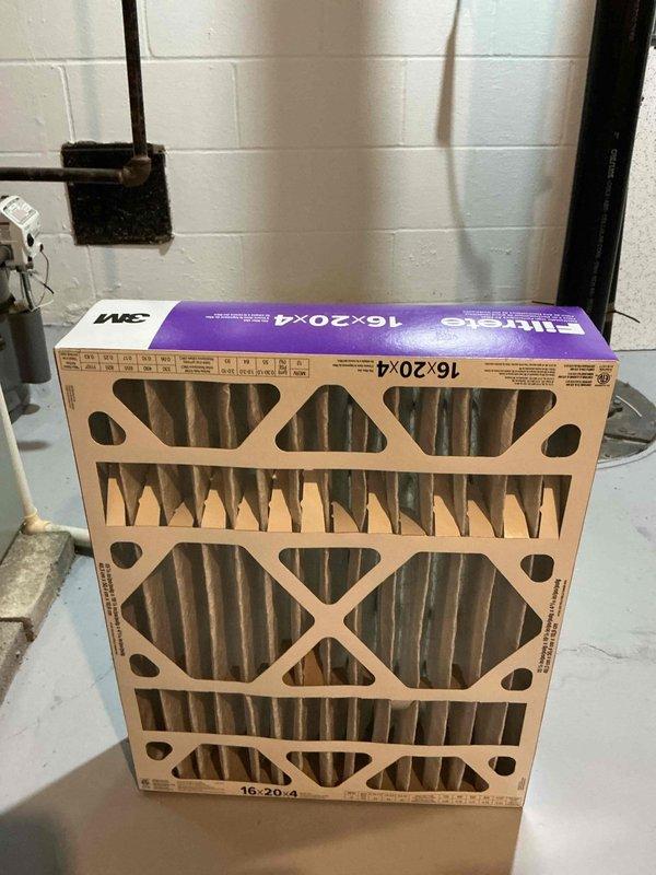 Completed cooling season tune-up on residential HVAC system. Inspected blower motor assembly, electrical connections, and capacitor, noting minor surface oxidation on terminals but all components functioning within normal parameters. Replaced 16x20x4 pleated air filter and verified proper airflow through system.
