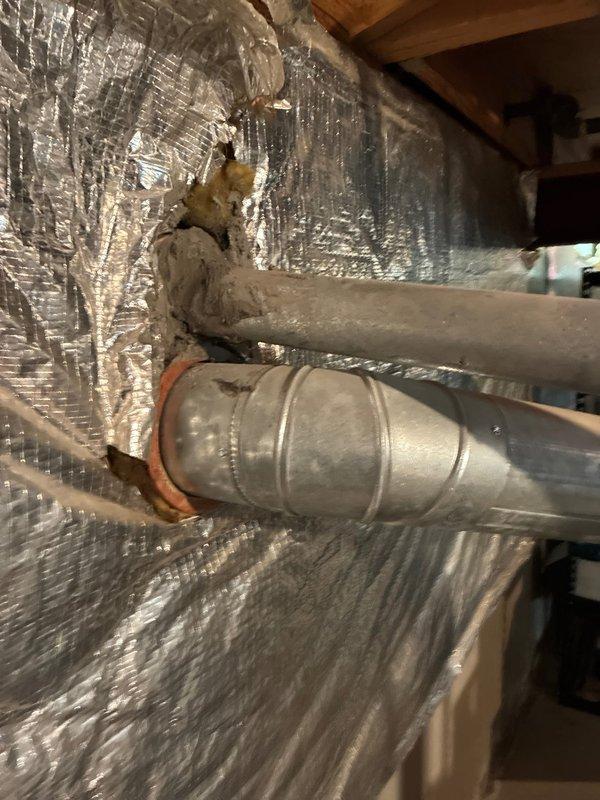 Conducted on-site evaluation of existing forced air cooling system to provide replacement options. Assessed current equipment configuration in attic space, including electrical service panel, conduit routing, and existing ductwork infrastructure. Documented deteriorated duct insulation and aging mechanical components. Evaluated electrical capacity and gas line positioning for compatibility with replacement unit specifications. Photographed existing installation conditions to support equipment sizing recommendations and identify any necessary modifications to electrical, ductwork, or structural supports required for new system installation.