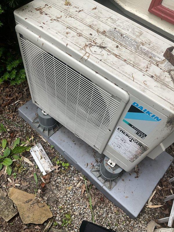 # HVAC Cooling Maintenance Completed

Performed comprehensive preventive maintenance on a Daikin ductless mini-split cooling system. Serviced wall-mounted indoor evaporator unit and outdoor condenser unit. Indoor unit inspected for proper operation, airflow, and filter condition. Outdoor condenser unit evaluated on concrete pad with proper mounting observed. Noted moderate rust staining and corrosion on top panel surfaces of outdoor unit, consistent with normal weathering exposure. Unit operational and cooling effectively. System functioning within normal parameters at time of service completion.