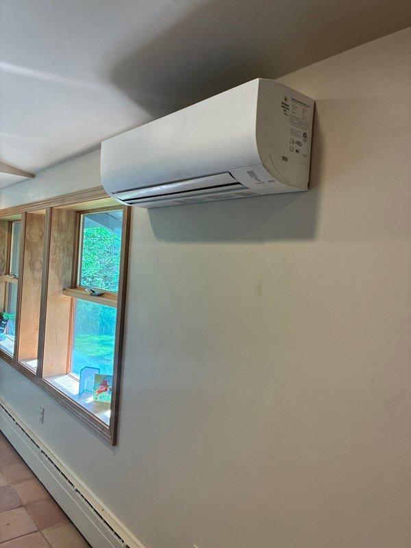 Completed installation of ductless mini-split air handler system including indoor wall-mounted unit and associated electrical connections. System was properly wired, tested, and confirmed operational with all components functioning as designed.