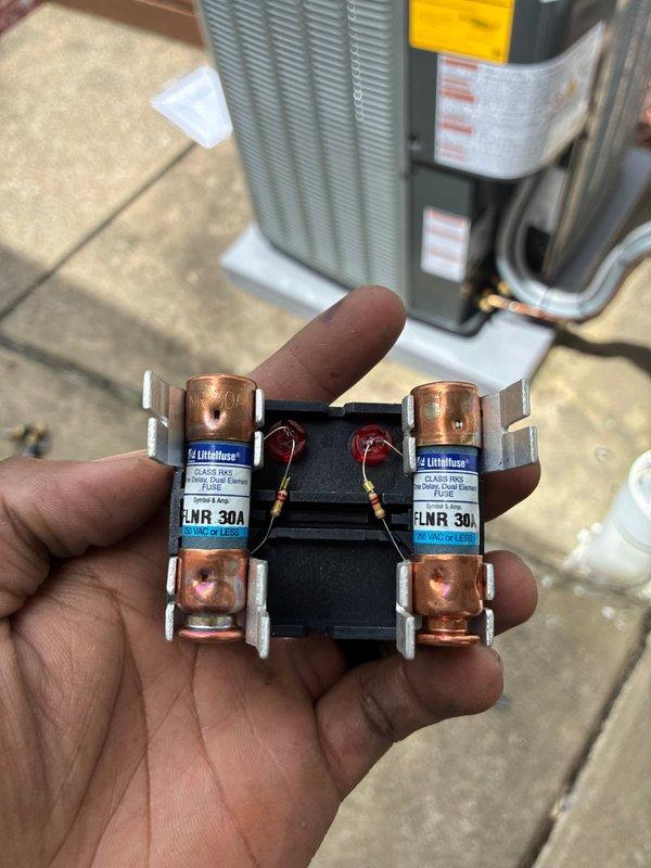 Completed full HVAC system installation including 96% efficiency gas furnace and air conditioning unit. Installed new condenser unit on exterior pad with proper refrigerant line connections and electrical service including 30-amp time delay fuses rated for 600V. Verified system operation with supply air temperature reading of 48.9°F, confirming proper cooling performance. Sealed all ductwork connections and tested electrical components for safe operation. System commissioned and left in full working order.