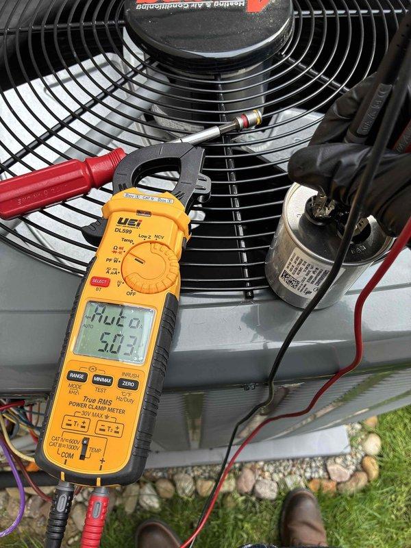 Performed seasonal AC start-up and cooling maintenance on system that was installed during cold weather conditions when initial operation was not possible. Tested and verified proper electrical operation of condenser unit components including capacitor function and amperage draw using digital multimeter, confirming all readings within manufacturer specifications. Measured refrigerant charge at 6.25 oz to ensure proper system capacity and optimal cooling performance for the upcoming season.