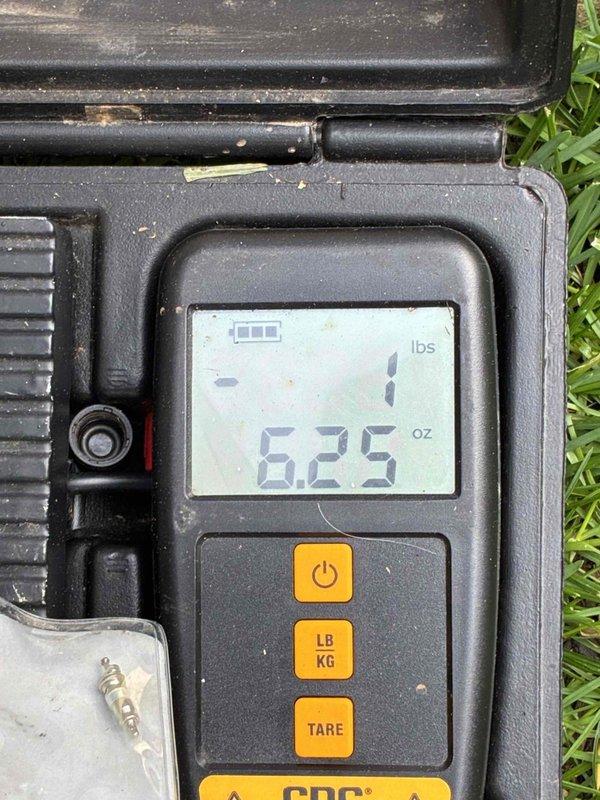 Performed seasonal AC start-up and cooling maintenance on system that was installed during cold weather conditions when initial operation was not possible. Tested and verified proper electrical operation of condenser unit components including capacitor function and amperage draw using digital multimeter, confirming all readings within manufacturer specifications. Measured refrigerant charge at 6.25 oz to ensure proper system capacity and optimal cooling performance for the upcoming season.