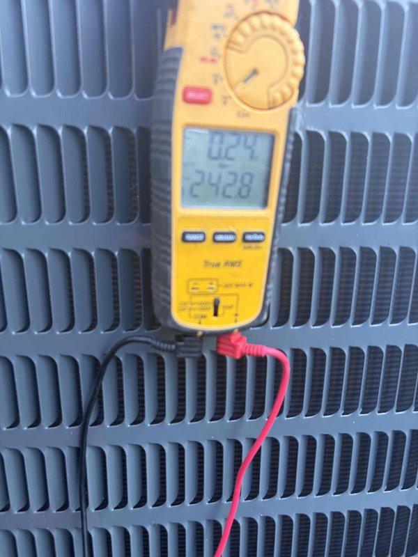 Completed scheduled preventive maintenance on residential air conditioning system. Performed comprehensive inspection of outdoor condenser unit, including electrical testing with multimeter to verify proper voltage and amperage readings. Condenser coil fins were found in good condition with no visible damage or debris accumulation. Unit operating within normal parameters with all components functioning properly.
