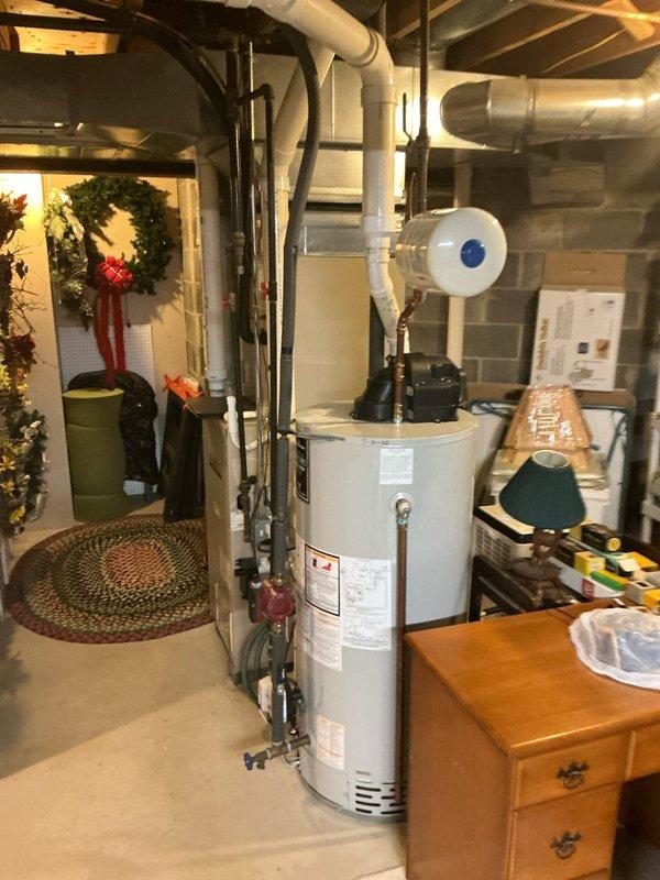 Conducted comprehensive estimate consultation for full HVAC system replacement in residential basement installation. Reviewed previous quote from September 2025 with customer who approved moving forward with originally proposed equipment and scope of work. Assessed existing furnace and ductwork configuration, documented current system layout including metallic ductwork connections, air filtration components, and utility clearances for proper replacement planning and code compliance.