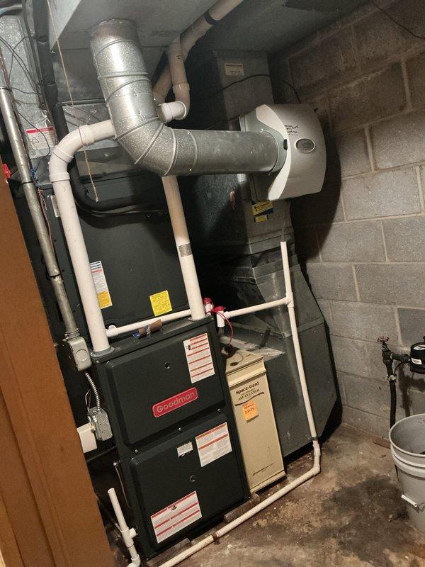 Completed scheduled preventive maintenance on residential cooling system. Performed comprehensive inspection of Goodman HVAC unit including electrical testing of compressor amperage draw and system diagnostics using digital clamp meter to verify proper operation. All components found operating within manufacturer specifications with no deficiencies noted.