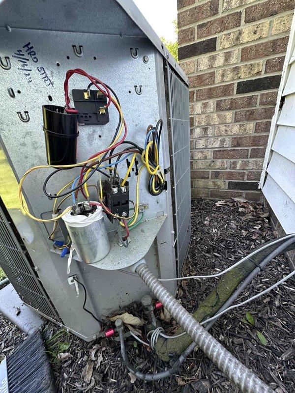 Completed routine cooling maintenance on outdoor HVAC unit. Inspected electrical components including capacitors, contactors, and wiring connections; all found to be in proper working condition with secure terminations. Evaporator coil exhibited heavy frost accumulation, indicating system is operating and cooling effectively with proper refrigerant charge and airflow.

---

Performed comprehensive seasonal maintenance inspection on residential air conditioning system. Removed and secured access panel to examine internal electrical components, verifying proper operation of dual-run capacitor, contactor assembly, and associated control wiring. All electrical connections were tight and showed no signs of arcing or deterioration. Checked evaporator coil and confirmed significant frost buildup on coil surface, measuring ambient temperature of 68°F, which demonstrates unit is achieving proper temperature differential and refrigerant cycle is functioning as designed. System operational and re
