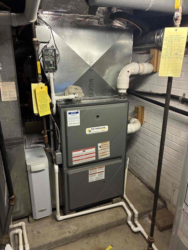 Completed installation of new air conditioning system including outdoor condensing unit and indoor evaporator coil integrated with existing furnace. Installed Honeywell Home ProSeries digital thermostat for system control and programming. Verified proper refrigerant charge, tested all electrical connections, confirmed adequate airflow through ductwork, and ensured proper condensate drainage through existing PVC piping system.