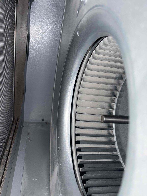 Performed comprehensive cooling system maintenance on outdoor condensing unit and indoor air handler. Accessed electrical compartment to inspect contactor, capacitor, and control wiring connections; verified all electrical components functioning properly with no signs of wear or loose connections. Inspected blower wheel assembly and heat exchanger coil, confirming proper operation and airflow with normal dust accumulation present.