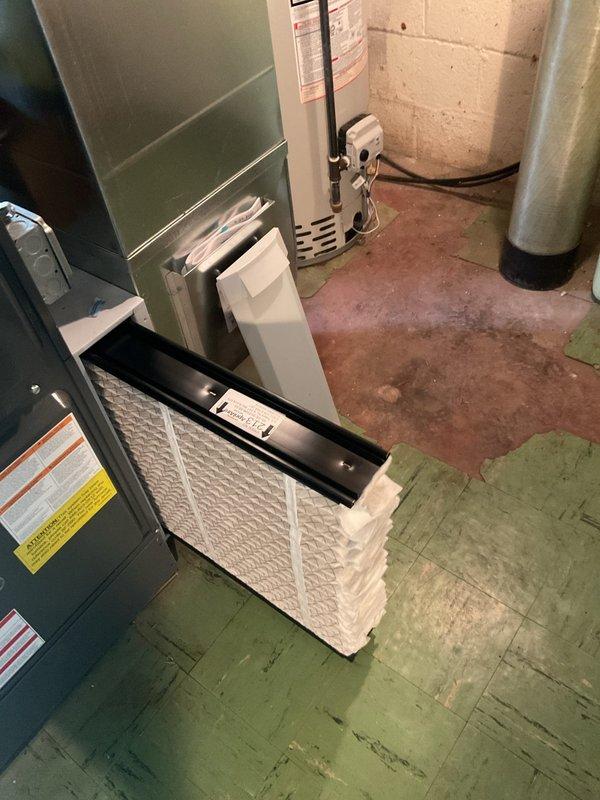 Completed seasonal cooling maintenance on residential HVAC system located in basement mechanical room. Performed comprehensive inspection of air conditioning equipment, replaced air filter, checked refrigerant lines and connections, and verified proper operation of all cooling components. System is operating within normal parameters and ready for the cooling season.