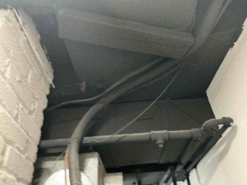 Conducted HVAC system evaluation and provided replacement options for existing furnace and air conditioning equipment. Customer expressed interest in available promotions for complete system upgrade. Documented current equipment configuration including basement-installed furnace with standard ductwork connections and existing refrigerant line routing through ceiling space.