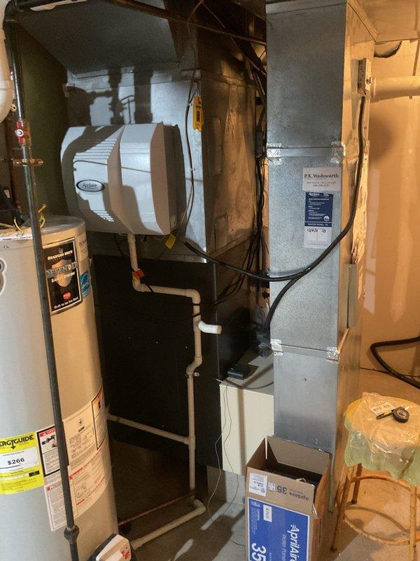Completed scheduled preventive maintenance on residential cooling system including Amana outdoor condenser unit and indoor air handler with integrated Aprilaire humidifier. Performed comprehensive inspection of outdoor unit, verified proper refrigerant levels, cleaned condenser coils, checked electrical connections, and confirmed fan motor operation. Inspected indoor components including air handler, ductwork connections, and humidity control system to ensure optimal performance for the cooling season.