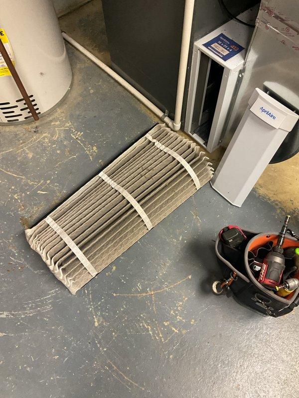 Performed comprehensive cooling system maintenance on outdoor condensing unit and indoor air handler. Conducted diagnostic testing of electrical components using multimeter, verified capacitor operation and compressor functionality with CoreSense monitoring device. Replaced heavily soiled air filter that showed significant dust and debris accumulation, which was restricting airflow and reducing system efficiency. All electrical connections tested and verified within normal operating parameters, system operational upon completion.