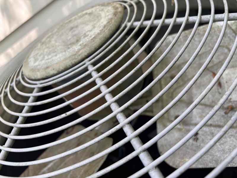 Completed comprehensive HVAC cooling system maintenance on outdoor condensing unit, including inspection of electrical components, capacitor testing, contactor operation verification, and fan motor assembly evaluation. Also performed hot water tank maintenance as part of scheduled preventive maintenance visit.