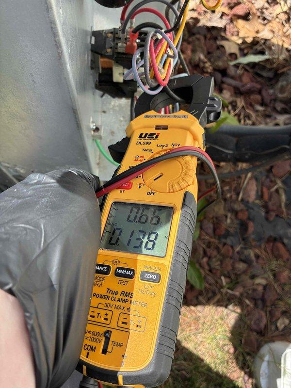 Completed scheduled cooling system maintenance on outdoor AC unit. Performed electrical diagnostics using clamp meter, verifying proper amperage draw and system performance. Measured supply air temperature at 48°F, confirming adequate cooling output and proper refrigerant charge. All system components operating within normal parameters.