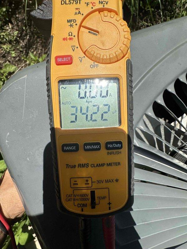Completed scheduled preventive maintenance on two cooling systems. Inspected condenser coils and found vegetation growth near unit fins, which was addressed to ensure proper airflow and heat exchange efficiency. Performed electrical measurements using clamp meter to verify system amperage draw and operational parameters, confirming both units are operating within manufacturer specifications.
