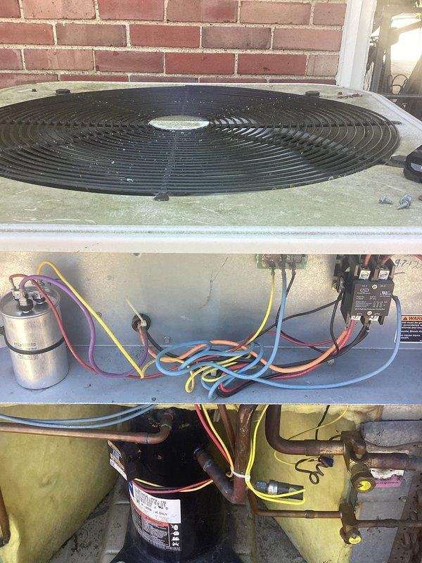 Completed electrical inspection of rooftop HVAC condensing unit and associated components. Documented electrical connections, capacitor, contactor assembly, and refrigerant line routing. Verified wiring configurations including power supply connections and control circuits. Inspected unit mounting, structural support framework, and surrounding rooftop installation conditions to ensure compliance with electrical safety standards.