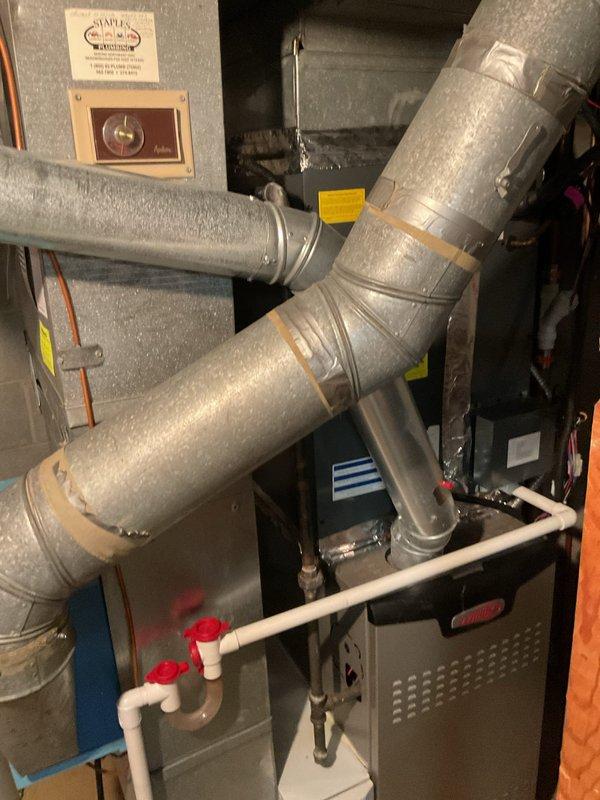 Completed scheduled cooling system maintenance on Bryant HVAC unit. Performed comprehensive inspection of furnace, ductwork, and associated mechanical components. Verified proper operation of thermostat controls, checked condensate drainage system with PVC piping and valves, and inspected all ductwork connections and insulation for proper sealing. All equipment operating within normal parameters with no issues identified.