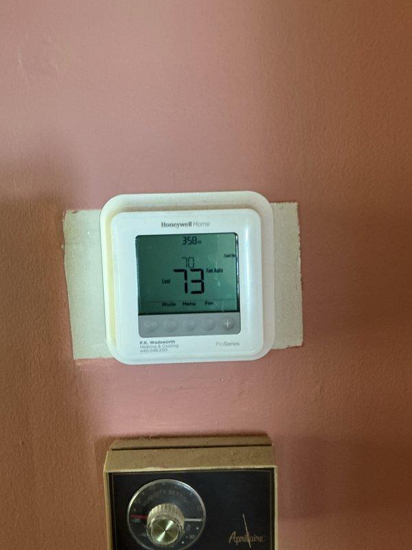 Completed scheduled preventive maintenance on residential cooling system. Performed comprehensive inspection of outdoor condensing unit, including visual assessment of cabinet condition, coil cleanliness, and overall system operation. Noted weathering and biological growth on exterior surfaces of unit and concrete pad. Verified thermostat operation and temperature settings inside residence, confirming proper communication between control system and cooling equipment. Addressed customer concern regarding non-functional outdoor water hose connection. All routine maintenance protocols executed per manufacturer specifications to ensure optimal system performance and reliability for continued operation.