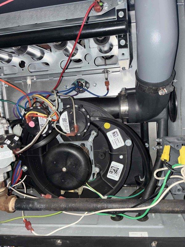Completed comprehensive cooling season maintenance on residential HVAC system. Performed inspection of outdoor condenser unit and indoor air handler components, including blower motor assembly, refrigerant lines, electrical connections, and condensate drainage system. All components found to be operating within normal parameters with no deficiencies noted; system ready for cooling season operation.