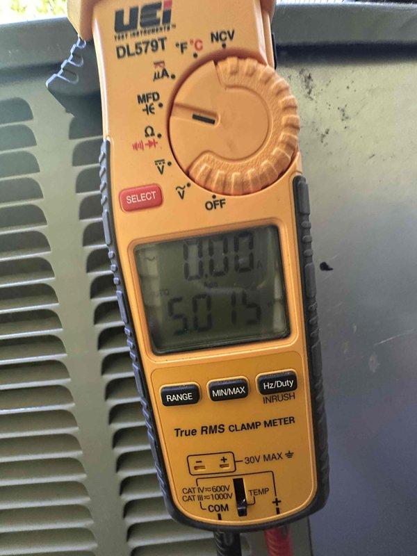Completed HVAC cooling maintenance service call. Upon arrival, attempted customer contact via phone and left voicemail regarding electrical system evaluation. Performed diagnostic testing using digital clamp meter to measure electrical parameters including voltage, amperage, and capacitance readings on the cooling unit. Inspection revealed accumulated dust and debris on the air intake grille and ventilation louvers, which can restrict airflow and reduce system efficiency. Documented equipment conditions with photos for service records.