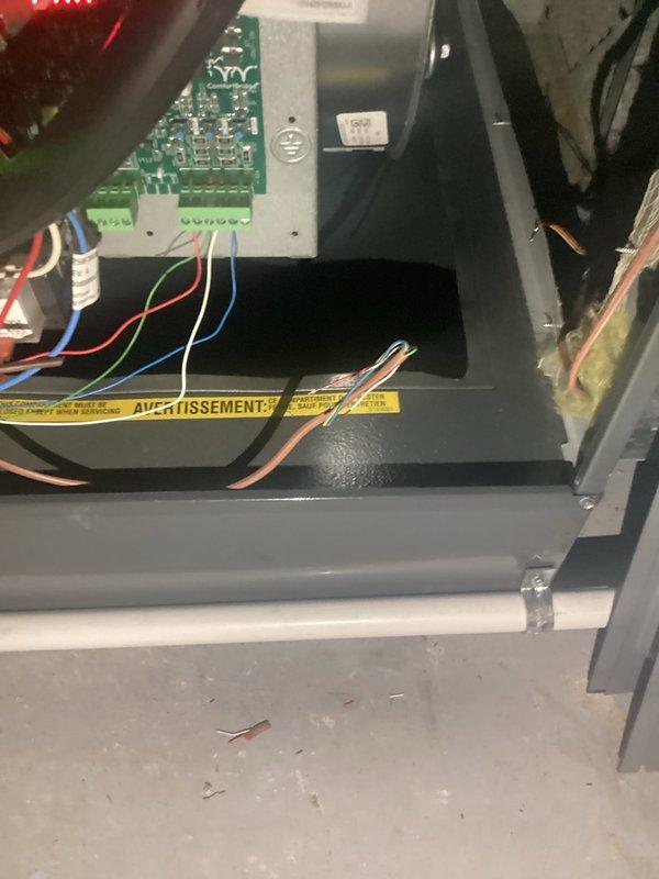Responded to no-cooling complaint on residential air conditioning system. Upon investigation, identified electrical wiring issue at outdoor condensing unit related to previous furnace installation work that had modified breaker panel connections. Corrected improper wiring connections at control board and verified proper voltage supply to AC unit. Tested system operation and confirmed cooling cycle initiated properly with all electrical components functioning as designed.