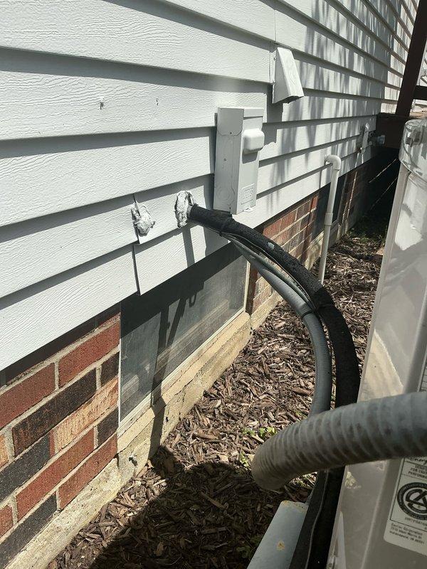 Conducted comprehensive evaluation of existing HVAC system for full replacement estimate. Assessed outdoor condensing unit located on exterior with adequate clearance and access from mulched service area. Evaluated indoor furnace and air handler configuration in basement mechanical room, noting current ductwork connections and available space for new equipment installation. Documented existing electrical disconnect, conduit routing, and power supply infrastructure. Photographed current system layout including furnace positioning adjacent to water heater, existing flexible ductwork runs, and overall equipment accessibility. Provided customer with multiple full system replacement options based on equipment age, configuration, and straightforward installation conditions with favorable access points for both indoor and outdoor components.