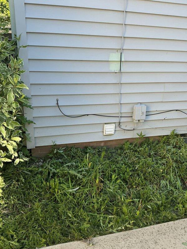 Conducted site assessment for exterior outlet installation. Customer requested new outdoor receptacle but was uncertain of optimal placement location. Evaluated exterior wall conditions and existing electrical infrastructure, including current conduit runs and junction boxes on vinyl siding. Assessed accessibility, code compliance requirements, and practical usage considerations for proposed outlet location. Documented existing electrical setup with exterior-rated fixtures and conduit routing. Provided consultation to determine most suitable placement based on customer needs, existing electrical service locations, and installation feasibility. Prepared recommendations for outdoor GFCI receptacle installation with weather-resistant enclosure.