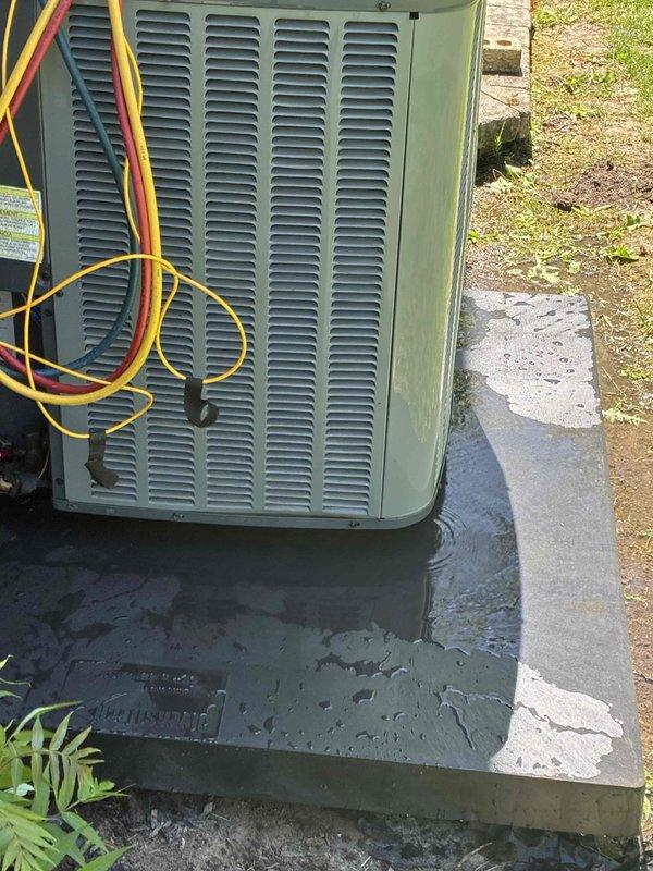 Performed pump down procedure on Ameristar air conditioning condenser unit and releveled equipment pad. Unit was properly evacuated of refrigerant using appropriate recovery methods and service gauges. Existing composite platform pad was adjusted and leveled to ensure proper drainage and equipment stability. Verified unit positioning on pad with level readings and confirmed secure placement on underlying paver base. System was recharged and tested for proper operation following pad leveling completion.