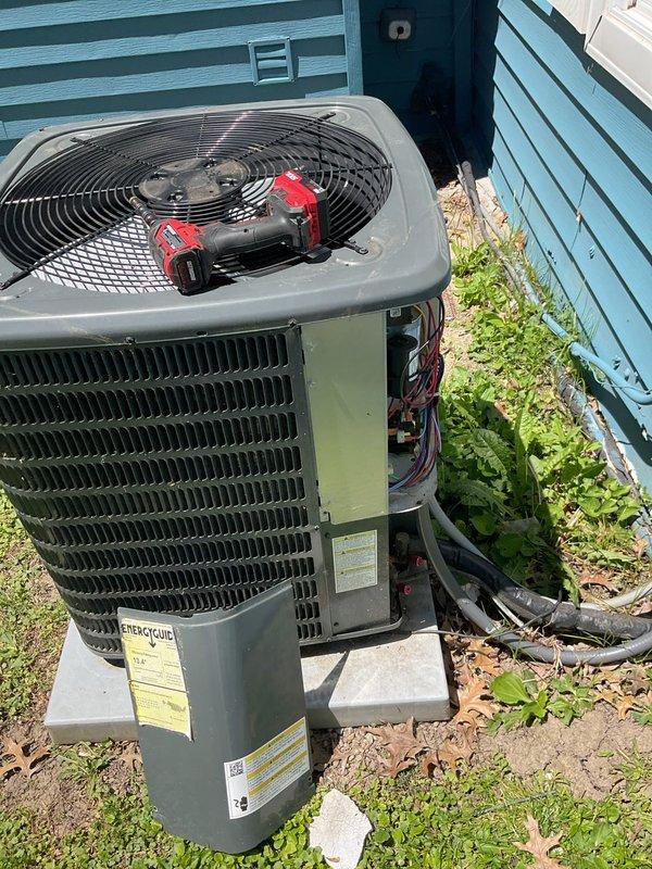 Completed scheduled cooling system preventive maintenance on residential air conditioning unit. Accessed electrical control panel to inspect contactor, dual run capacitor, and all electrical connections. Verified proper wiring integrity, tested capacitor values, and confirmed all electrical components operating within manufacturer specifications. System tested and operating normally upon completion.