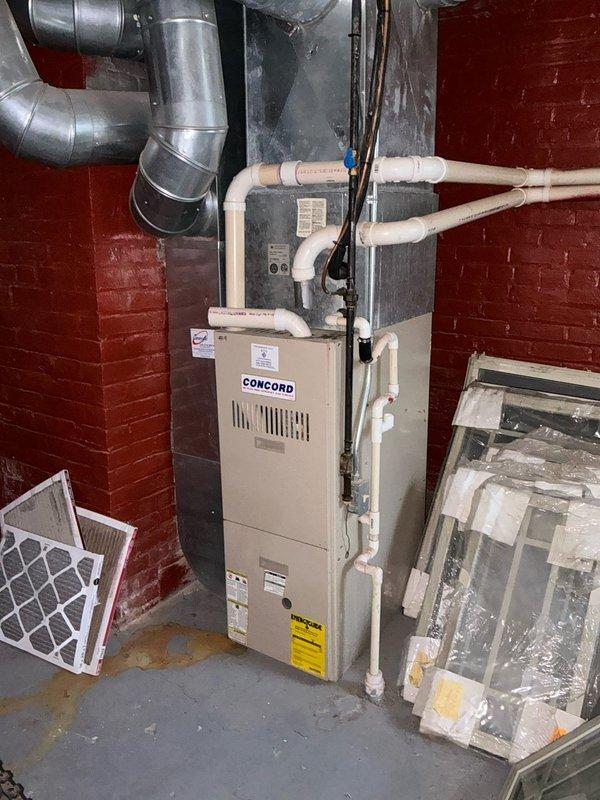 Conducted comprehensive equipment evaluation and provided replacement options for existing HVAC system consisting of rooftop unit requiring ladder access and basement-installed Concord furnace. Documented current system configuration including ductwork layout, furnace dimensions, and mechanical room conditions. Performed measurements of existing equipment and surrounding infrastructure to prepare accurate specifications for full system replacement proposal covering both heating and cooling components.