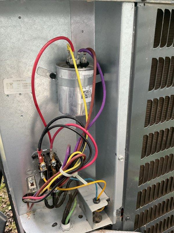 Completed cooling season tune-up on residential outdoor condensing unit. Inspected electrical components including capacitor, contactor, and wiring connections; all found secure and in good working condition. Verified proper operation of condenser fan motor and compressor.