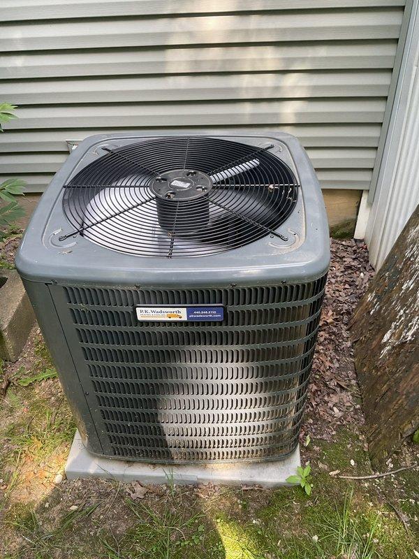 Completed cooling season tune-up on residential outdoor condensing unit. Inspected electrical components including capacitor, contactor, and wiring connections; all found secure and in good working condition. Verified proper operation of condenser fan motor and compressor.