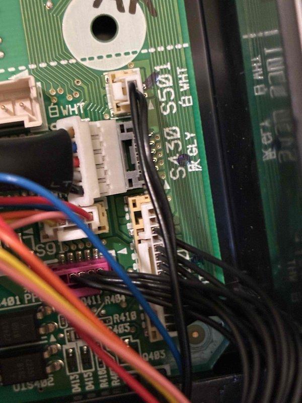 Installed Wi-Fi module on HVAC control board, requiring addition of fourth connector to complete integration with existing system. Module successfully mounted and wired into main circuit board with all necessary connections secured and tested for proper communication.