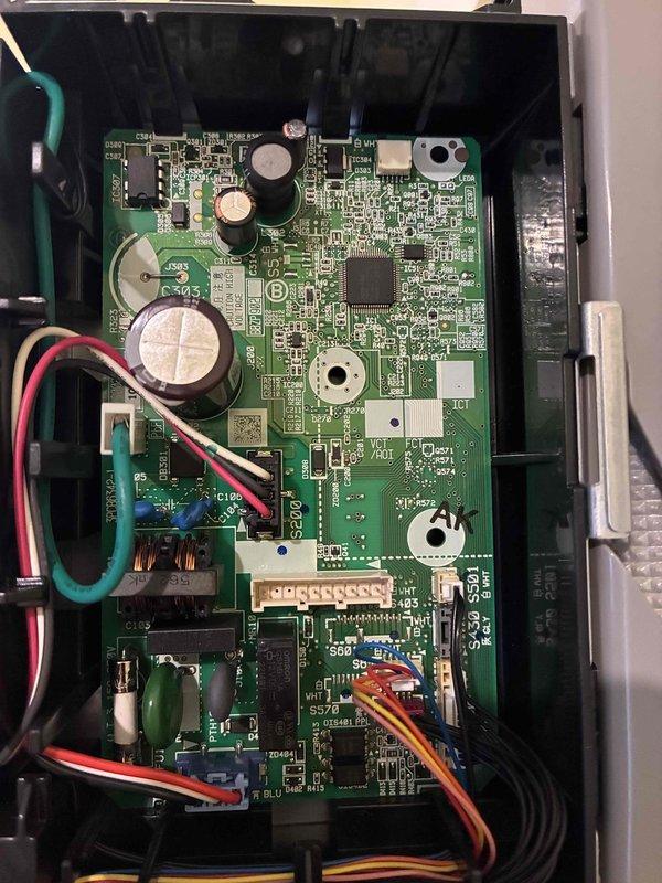 Installed Wi-Fi module on HVAC control board, requiring addition of fourth connector to complete integration with existing system. Module successfully mounted and wired into main circuit board with all necessary connections secured and tested for proper communication.